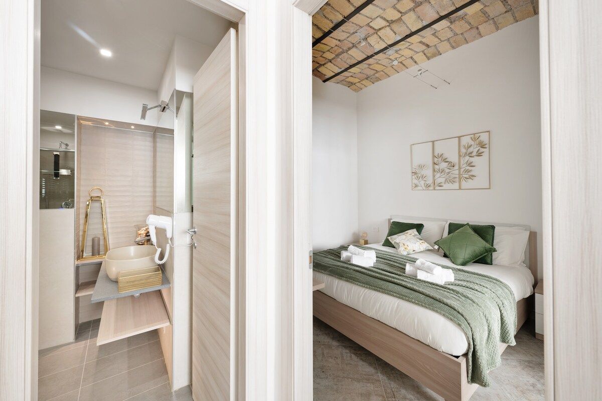 Bedroom seen from the bathroom door